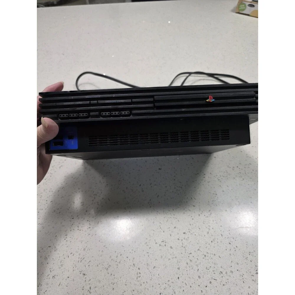 Sony PlayStation 2 Black Console and 8MB memory card. Playstation for parts only